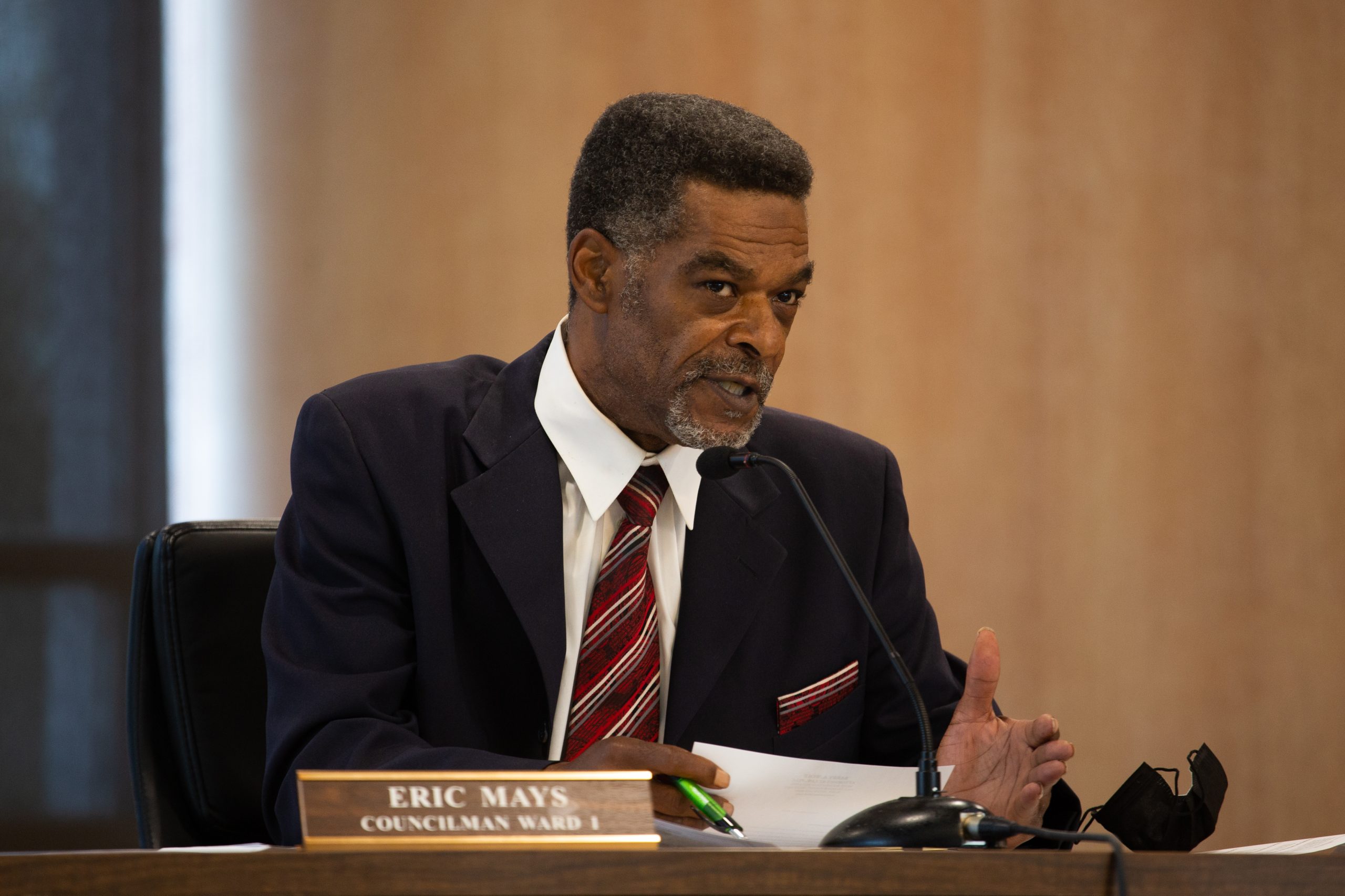 eric may sat at a council desk